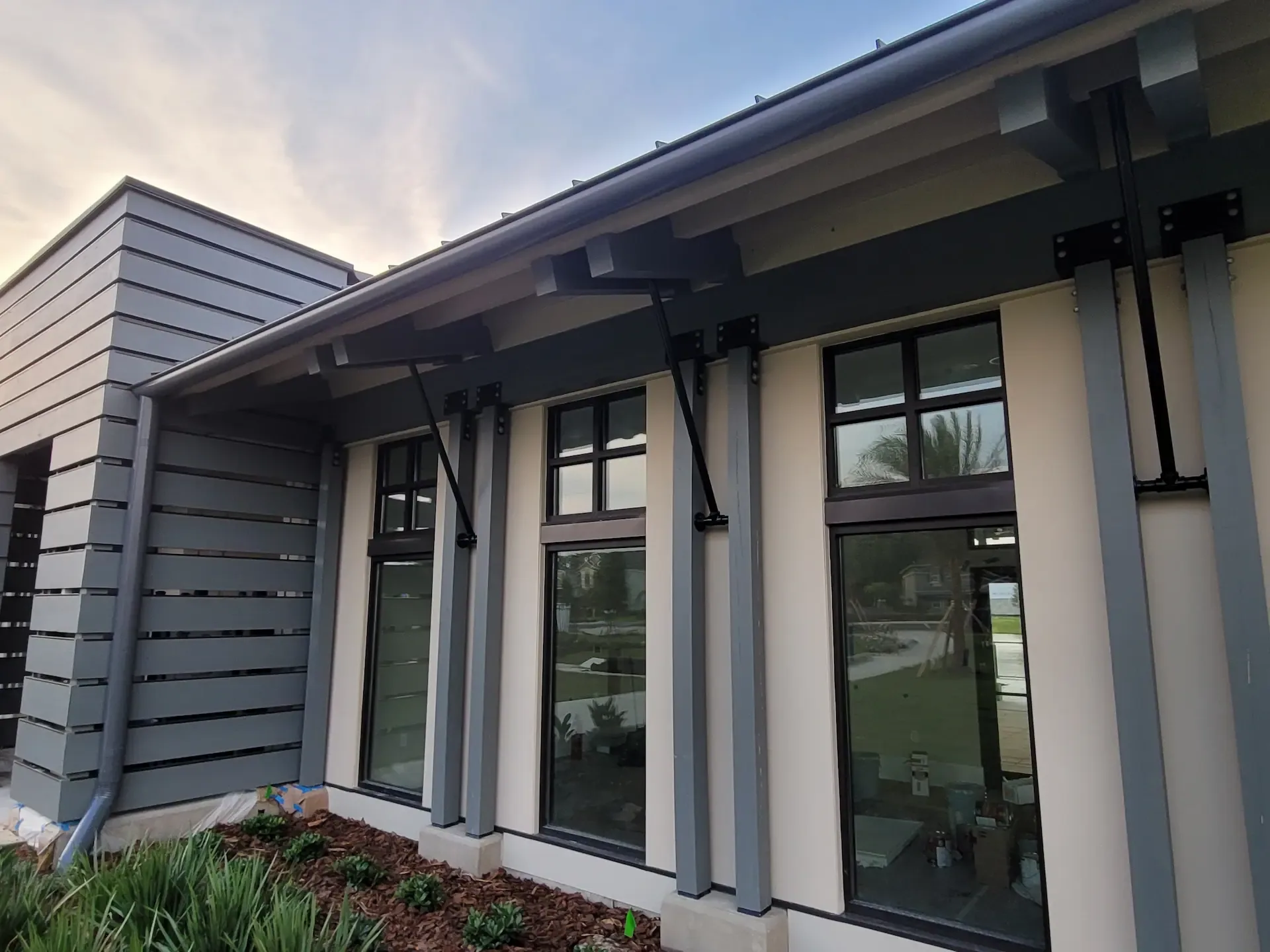 Dark gray box gutters modern commercial building, Lake Mary